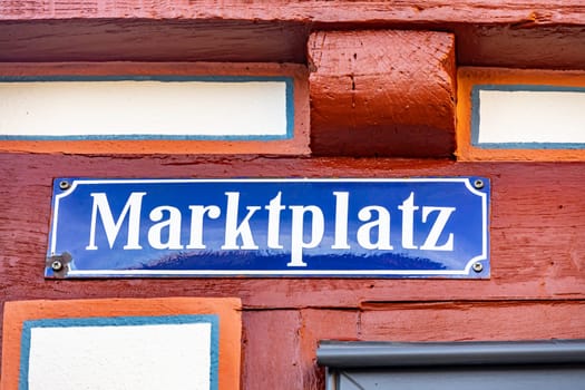 Marktplatz Sign means Marketplace Sign on a public building in Hesse, Germany.