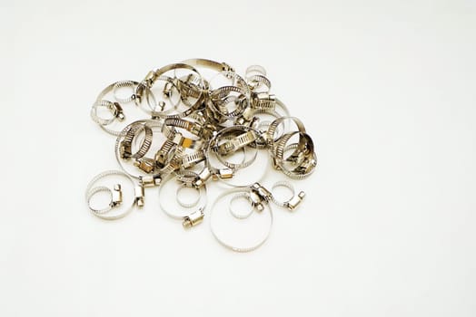 New stainless steel hose clamps isolated on white background