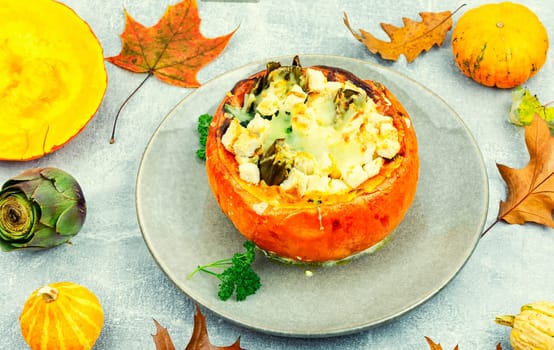 Half baked squash stuffed with mushrooms, spinach and artichoke. Autumn recipe