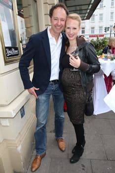 Frederik Braun with his heavily pregnant wife Johanna,premiere of "Lady Salsa"" at the St.Pauli Theater,Hamburg,May 31,2015"