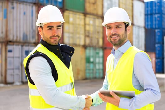 View of a Docker and supervisor handshaking in front of containers