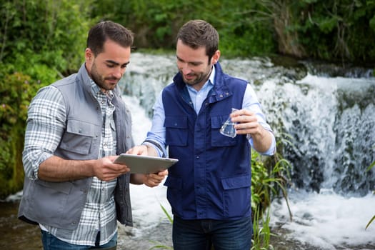 View of a Scientist and biologist working together on water analysis