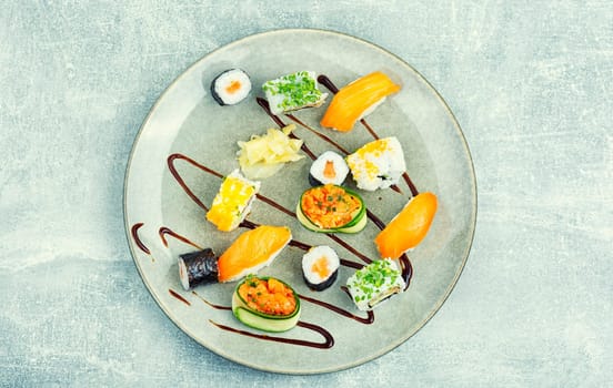 Delicious sushi rolls on the plate. Sushi menu. Japanese food.