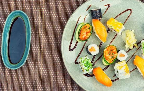 Delicious sushi rolls on the plate. Sushi menu. Japanese food.