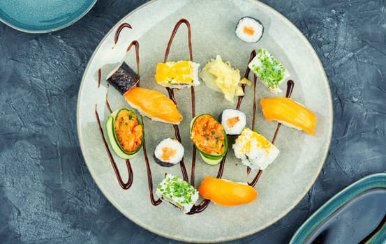 Delicious sushi rolls on the plate. Sushi menu. Japanese food.
