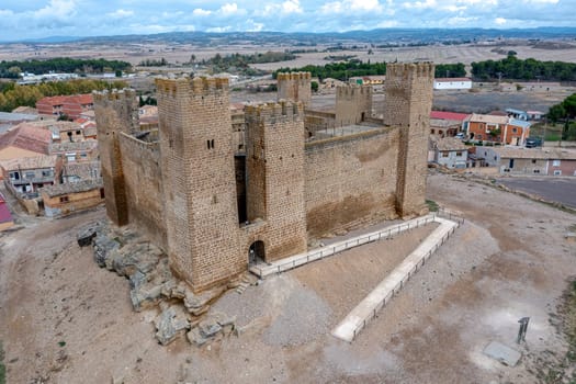 The castle of Sadaba on the rock on top of a small hill, in the region of Cinco Villas, Zaragoza, Aragon Spain