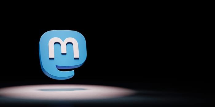Mastodon Logo 3D Symbol Shape Spotlighted on Black Background with Copy Space 3D Illustration