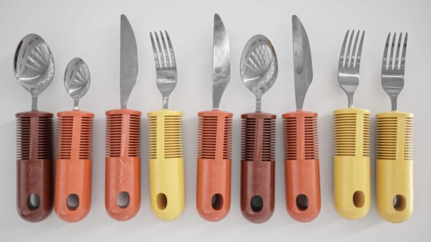 Ergonomic cutlery for the elderly, with arthritis, Parkinson's, apoplexy and the disabled -- 3D Rendering