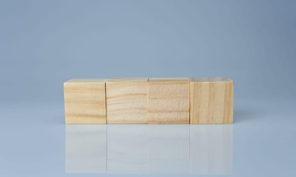 empty wooden blocks lined up on a white background. Business concept.