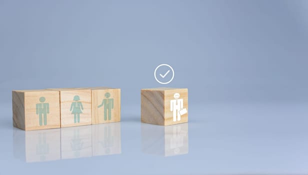 Concept of Business and HR for leadership and team leader. One cube wood block out in front  Different and stand out from the group