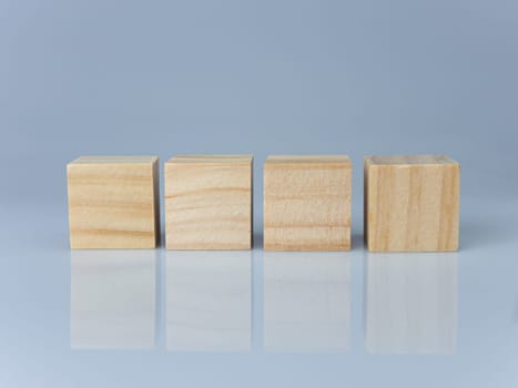 empty wooden blocks lined up on a white background. Business concept.