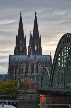 Cologne Cathedral and the Hohenzollern Bridge at dusk