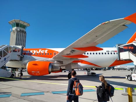 A plane of the airline EasyJet at the airport of Split,the first passengers on the way to the machine