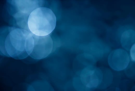 Light abstract dark bokeh christmas circle color glitter blurred black background