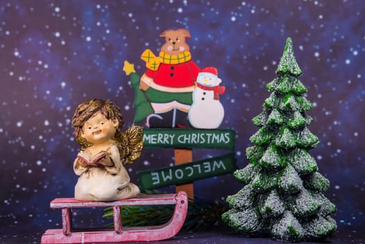 merry christmas board with angel, Santa Claus and christmas tree