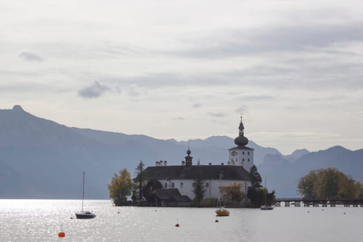 Castle Orth on lake Traunsee, Austria. Castle Orth is an Austrian castle founded around year 1080 in Gmunden, Austria