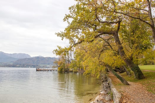 autumn view of lake and trees in Toscana Park, Gmunden