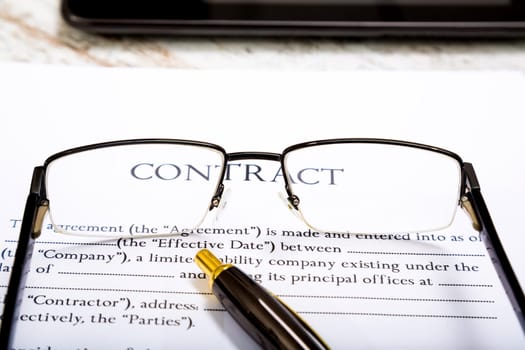 Reading a Contract before signing.
