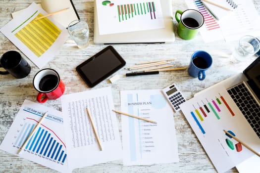 Business meeting, analyzing graphs, statistics and Business Plan