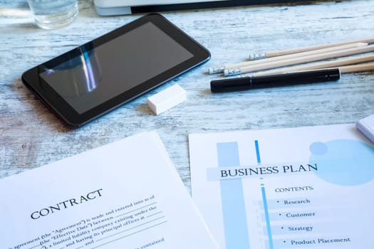 Analyzing a Contract and a Business Plan.