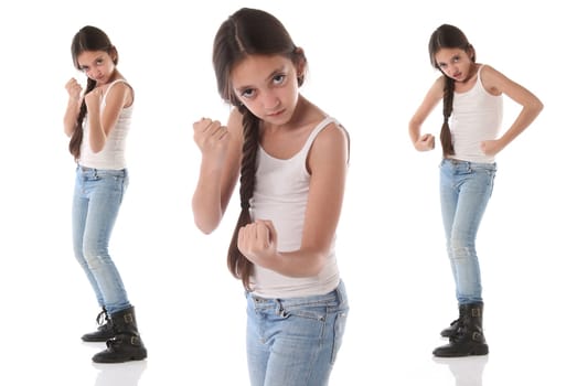 A beautiful young girl wants to fight. Isolated on white background