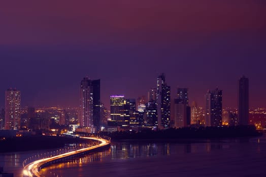 Panama City, Central America, view of Costa Del Este and Corredor Highway at night, with traffic jam of cars and vehicles
