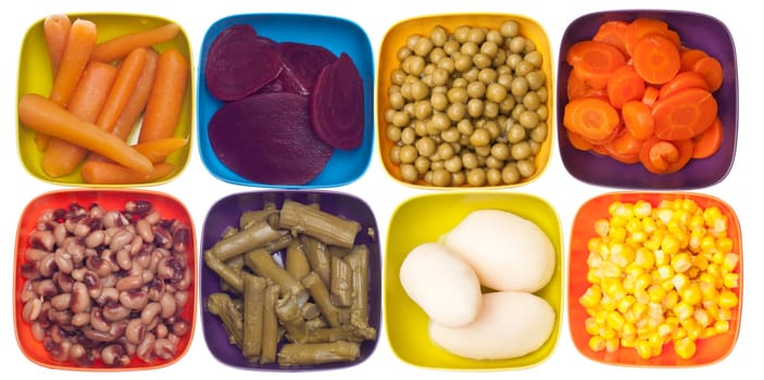 Peas, Potatoes, Corn, Carrots, Beets, Asparagus and Black Eyed Peas in Colorful Bowls.