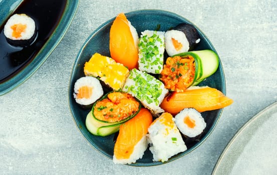 Appetizing sushi rolls on the plate. Seafood