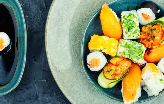 Appetizing sushi rolls on the plate. Seafood