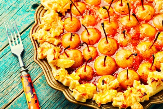 Homemade autumn pie, cake decorated with autumn pear.