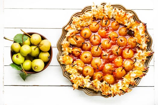 Homemade autumn pie, cake decorated with autumn pear.