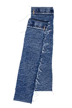Closeup of two cut-off pant leg pieces of a blue denim jeans isolated on white background. Clipping path. Macro.