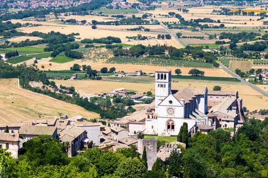 Assisi village in Umbria region, Italy. The town is famous for the most important Italian St. Francis Basilica (Basilica di San Francesco)