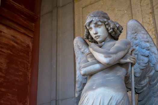 GENOA, ITALY - CIRCA AUGUST 2020: Angel sculpture by Giulio Monteverde for the Oneto family monument in Staglieno Cemetery, Genoa - Italy (1882)
