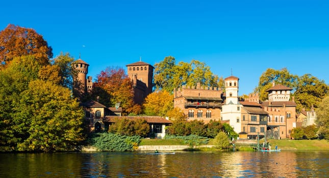 Turin, Italy - Circa November 2021: outdoors panorama with scenic Turin Valentino castle at sunrise in autumn
