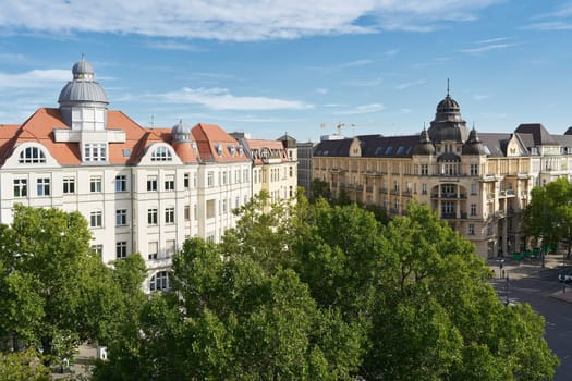 Expensive real estate in the form of historic stately homes and commercial buildings of the Gründerzeit on Kurfuerstendamm in Berlin