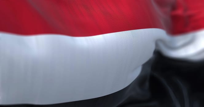 Close-up view of the Yemen national flag waving. The Republic of Yemen is a state located in Western Asia. Fabric textured background. Selective focus. 3D illustration