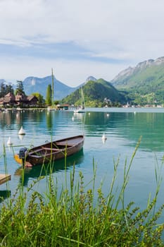 Wooden boat on the Lake of Annecy in the french Alps