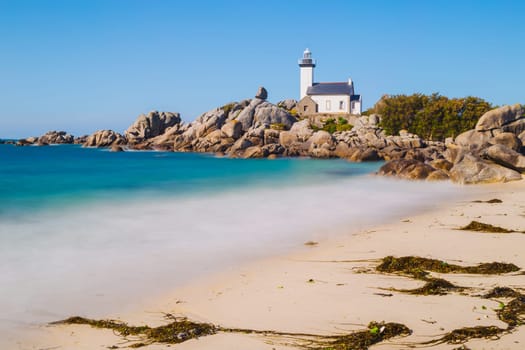 Pontusval lighthouse from the coast in Kerlouan, northern Brittany, France