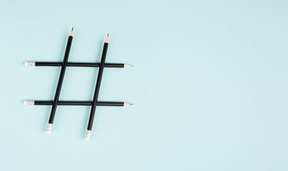 Hashtag made from pencils, social media communication, influencer and followers, viral content trend