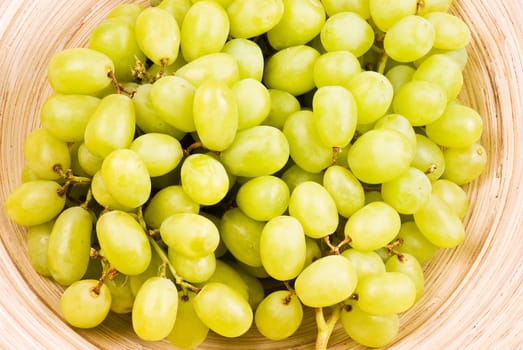Grape fruits in wooden bowl