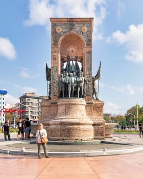 Istanbul, Turkey - September 2, 2022: Republic Monument, or Cumhuriyet Aniti Statue, at Taksim Square, in a sunny summer day