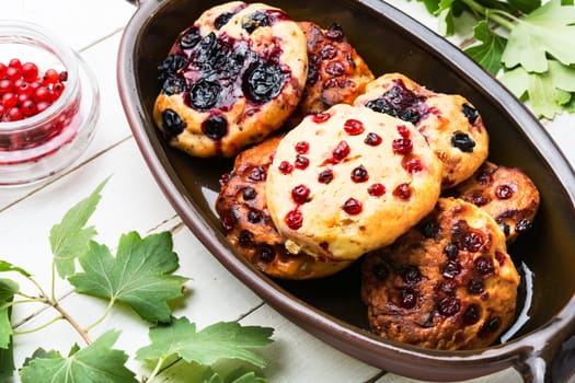 Appetizing cookies biscuit with red currants. Cookie with fruit berries