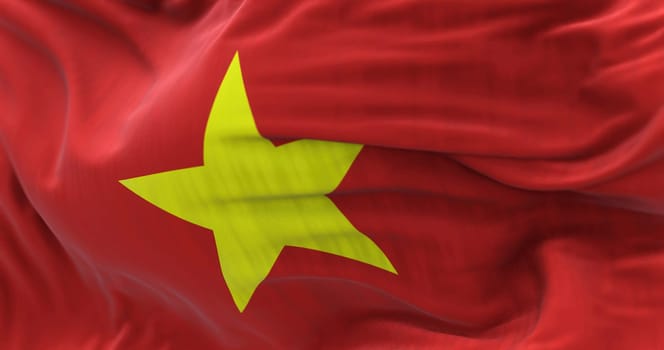 Close up view of the Vietnam national flag waving in the wind. The Socialist Republic of Vietnam is a country in Southeast Asia. Fabric textured background. Selective focus. 3D illustration