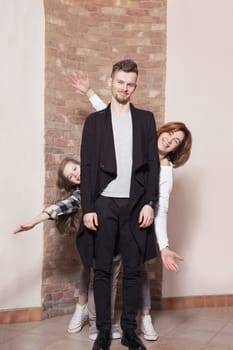 Portrait of happy family at home expressing joy and happiness