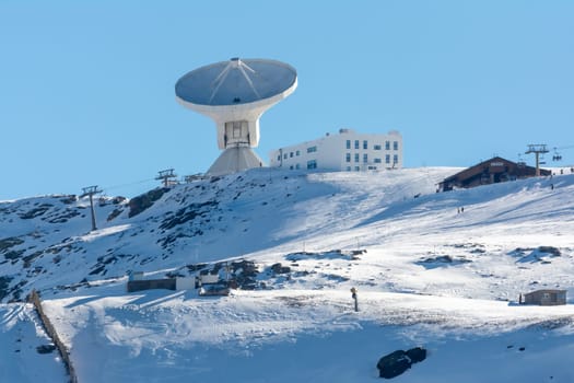 satellite dish radar antenna station in field. parabolic antennas. Big parabolic antenna against sky. Satellite dish at earth station with a sky.