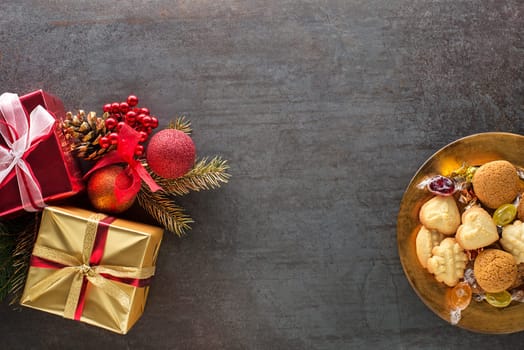 Christmas winter background with tasty homemade Christmas sugar cookies of all shapes and sizes. Top view with copy space