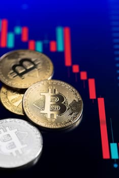 Coins with bitcoin logo drop at bear market. Pullback of leader cryptocurrency Bitcoin BTC in trading. Decentralized digital currency fell. Crypto collapse.