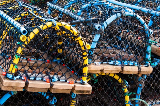 Closeup on Lobster pots on the dock, England
