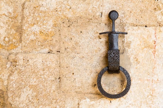Close-up of an antique ring for tying horses